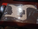 New Genuine Fender Pickguard For P. Bass - White Pearl, 099-2160-000. Fixed Price $39.99.