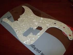 New - Fender Pickguard For Standard P. Bass Aged White Moto, 099-2176-000. Fixed Price $39.99.