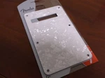 New - Genuine Fender Backplate For Strat White Moto, 099-1323-000. Fixed Price $18.19.